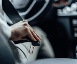 seatbelt being buckled in for safe driving