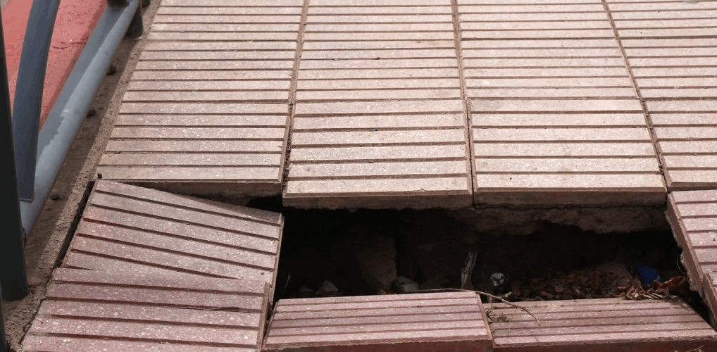 hole in the sidewalk causing a liability