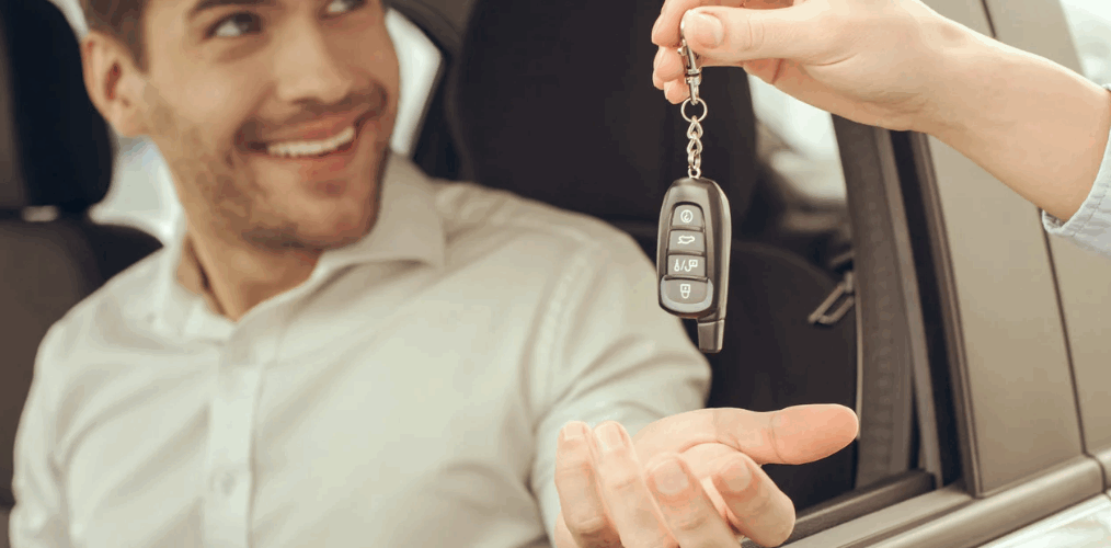 rental car keys being given to driver